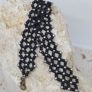 Bracelet en perle de rocailles noir et bronze